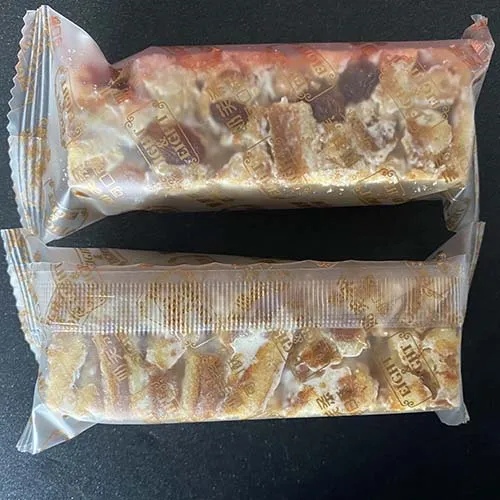 ماكينة تعبئة وتغليف أفقية (ذات بكرة سفلية)